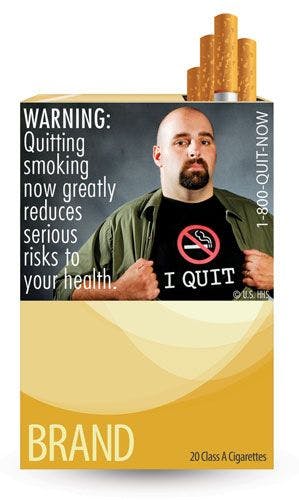 man with I quit shirt cigarette warning label