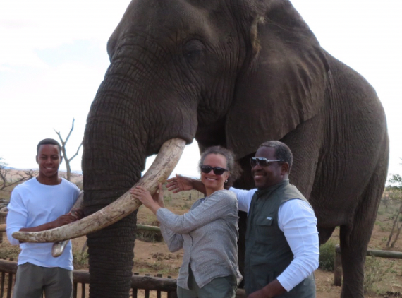 Pierce with her husband, T. Anthony Denton, JD, MHA, and their son Evan on an African safari in 2016