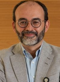 Carlos Fernández de Larrea, MD, PhD