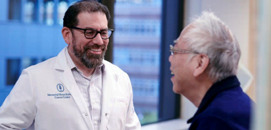 Diaz chats with a patient at MSK. Michael Foote, MD, a medical oncologist at MSKCC, calls Diaz “one of the most brilliant, creative, caring, people I have ever met.”