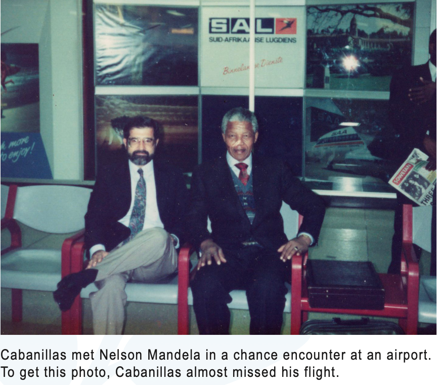 Cabanillas met Nelson Mandela in a chance encounter at an airport. To get this photo, Cabanillas almost missed his flight.