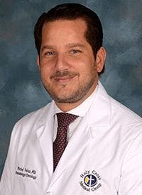 Michel Velez, MD, a medical oncologist at Holy Cross Hospital
