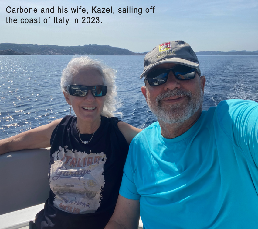Carbone and his wife, Kazel, sailing off the coast of Italy in 2023.