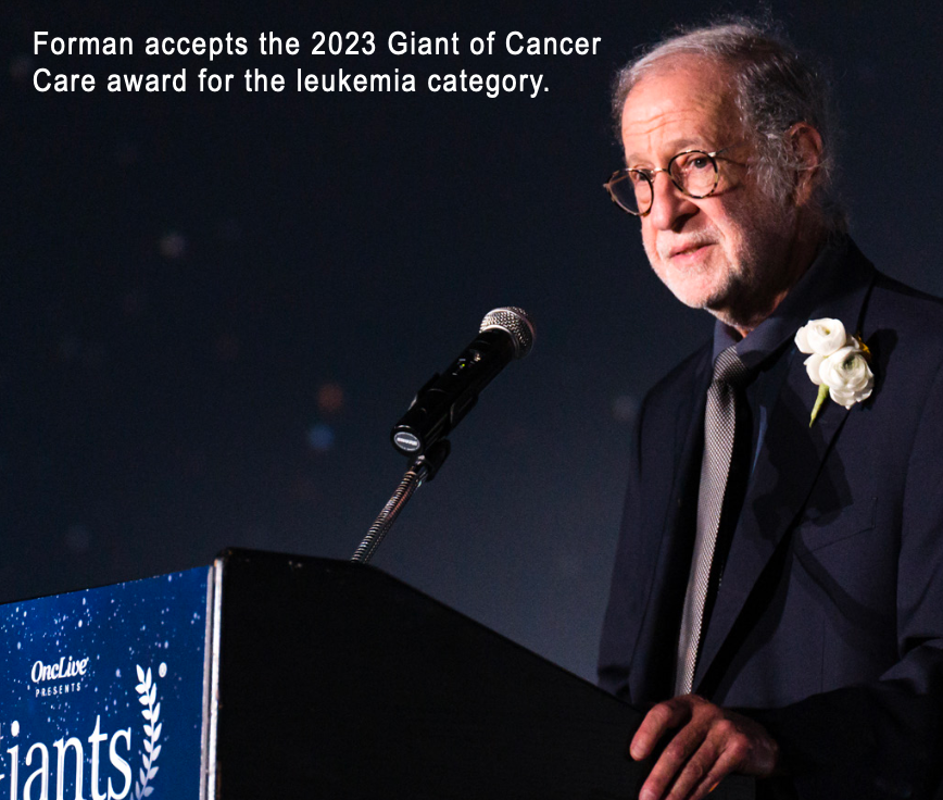 Forman accepts the 2023 Giants of Cancer Care award for the leukemia category.